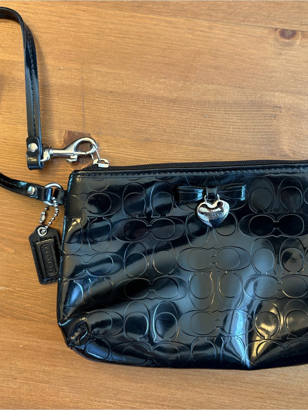 Coach patent leather Black wristlet with Heart Charm signature silver hardware